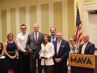Superintendent-Director Ernest F. Houle with Gov. Charlie Baker