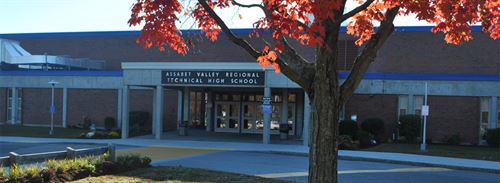 A wide angel view of the school entrance in fall