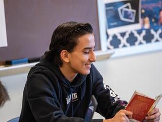 A student reading a book