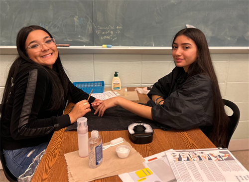 students painting nails