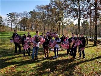 Students holding flags
