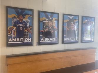 Posters on a wall created by DVC